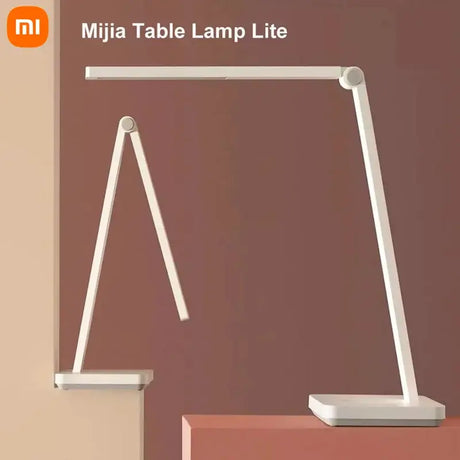 there is a white lamp that is on a table