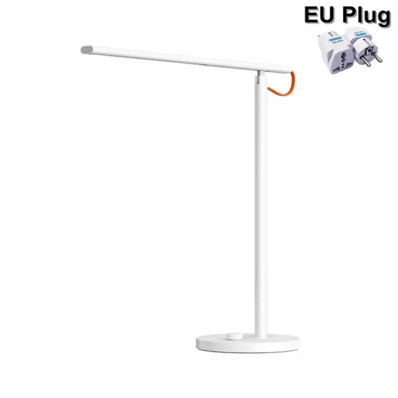 the eu plug table lamp is a white, metal base with an orange cord