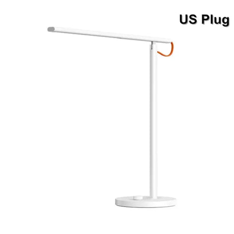 the u - plug table lamp is a white and orange led