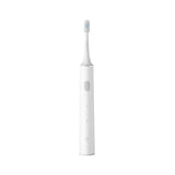 a white electric toothbrush with a blue light on the top