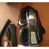 a close up of a vacuum cleaner and other items on a table