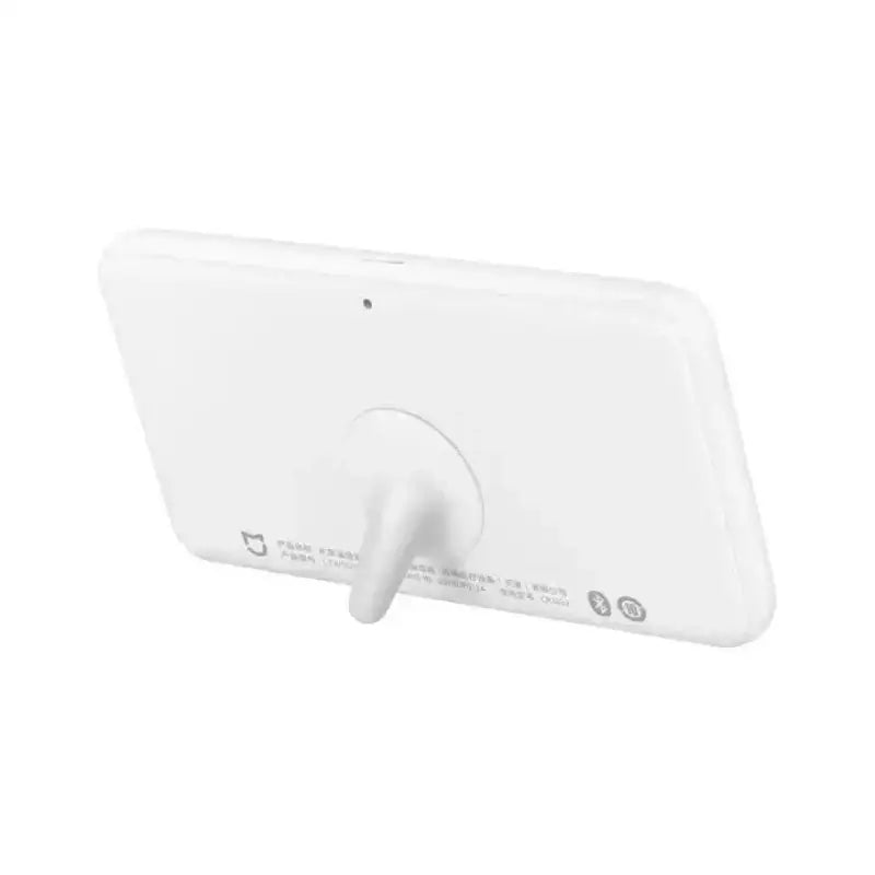 the wireless charger is shown in white