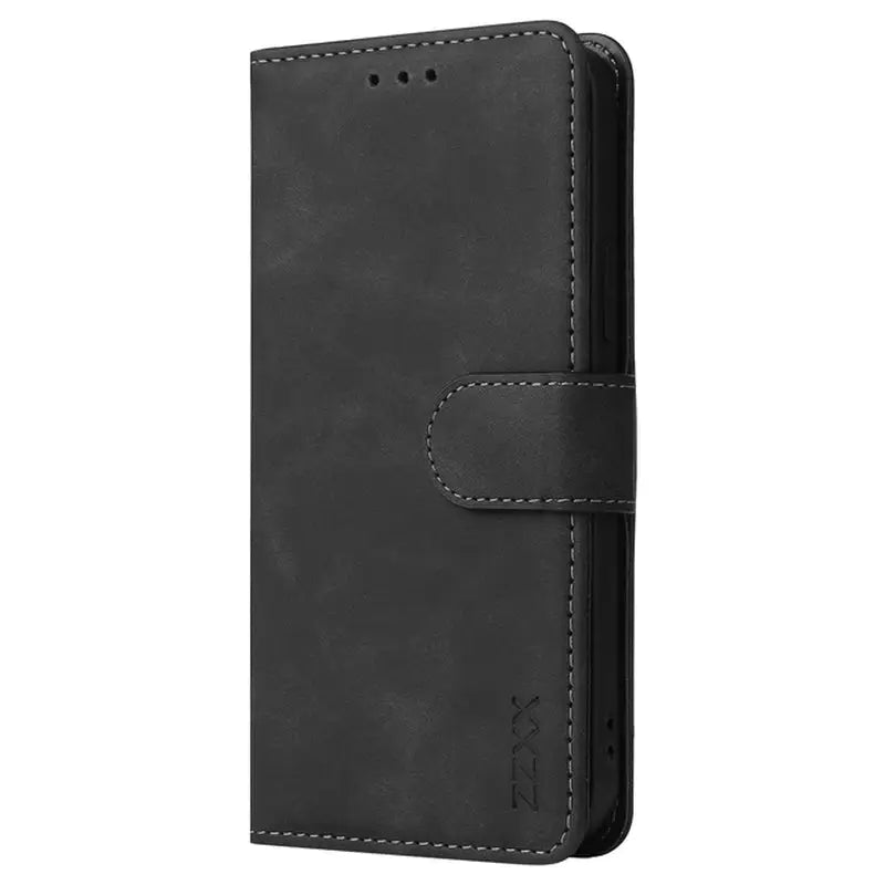 the black leather iphone case is shown with a white stitching