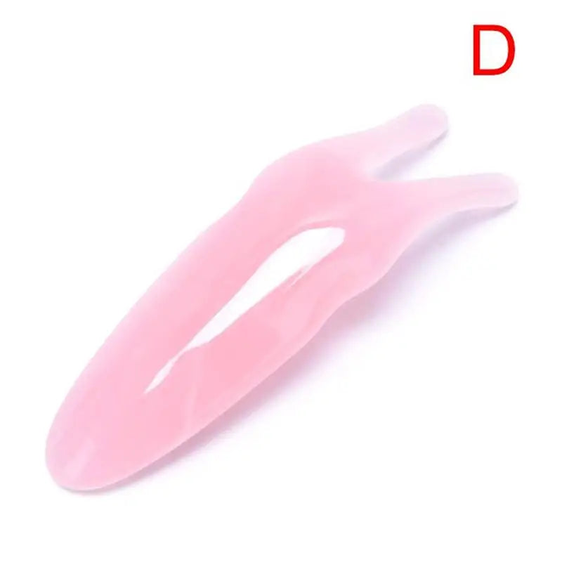 a pink plastic nose with a white background