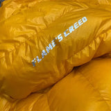 a yellow sleeping bag with the word’i’m’on it