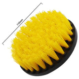 a yellow brush with a black handle