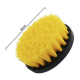 a yellow brush with a black handle