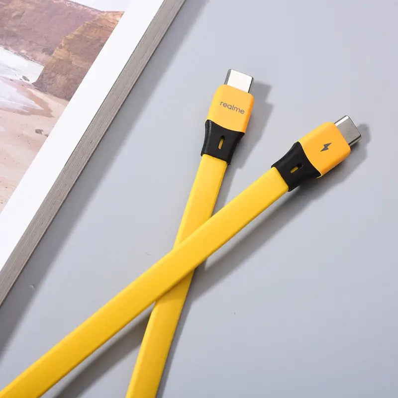 a yellow cable with a black and white cord