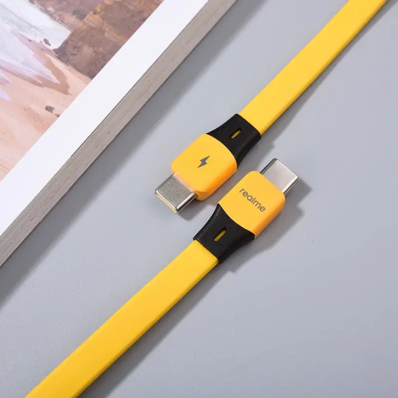 yellow and black usb cable connected to a computer monitor