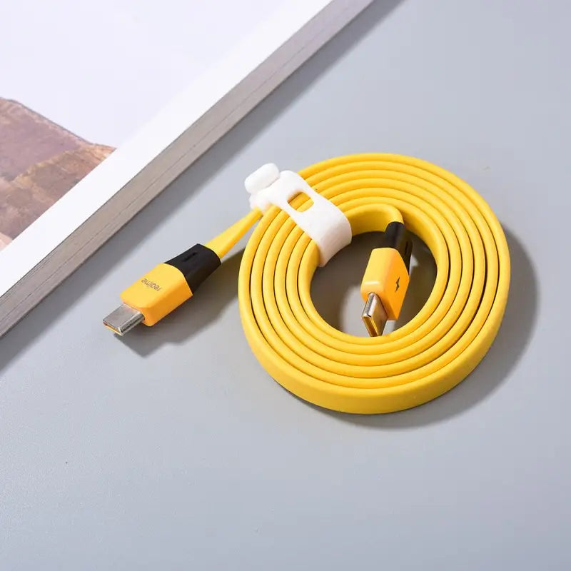 a yellow cable with a white cord