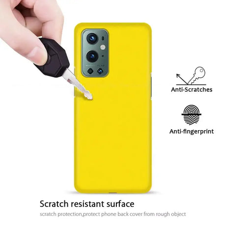 The yellow case is being held up by a hand