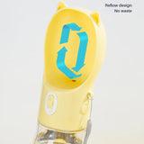 a yellow cat shaped water bottle with a blue arrow on it