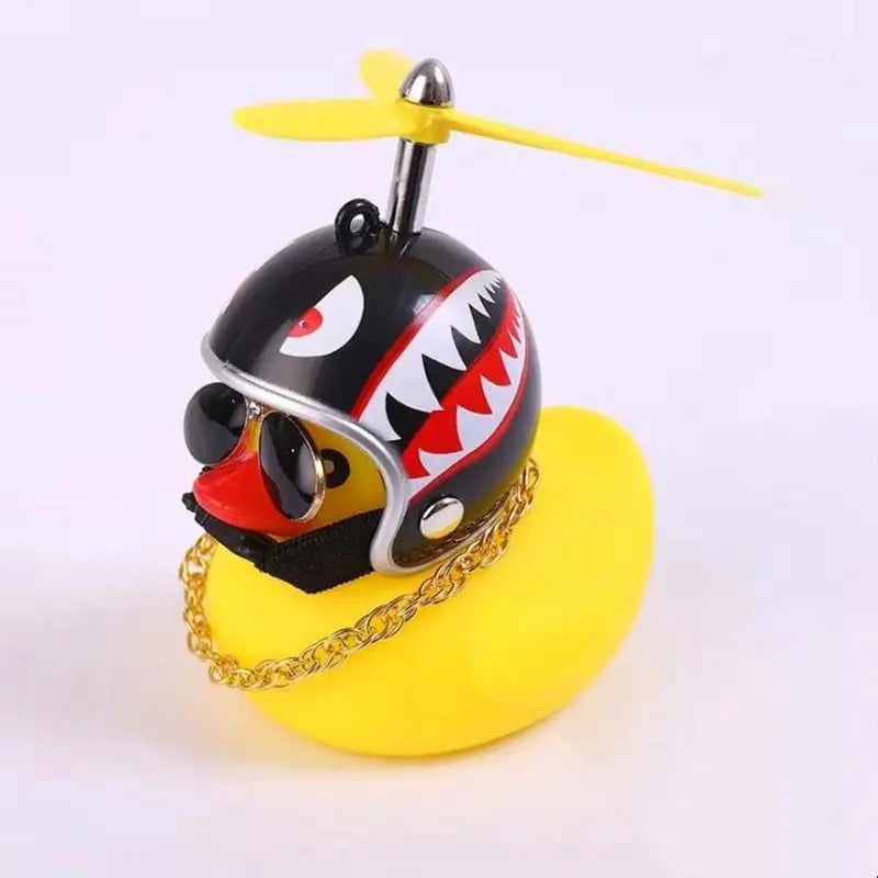 a toy with a yellow chain around it