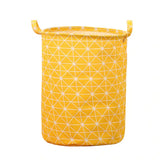 a yellow fabric storage bag with a geometric pattern