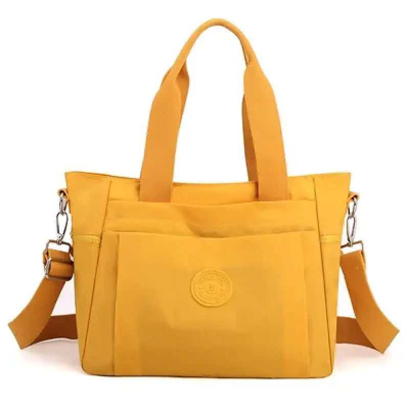 a yellow handbag with a zipper closure