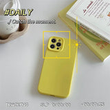 a yellow phone case with a camera on it