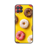 a yellow phone case with donuts on it