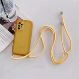 yellow phone case with a yellow lanyard strap and a water bottle