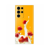 a yellow phone case with strawberries and milk