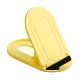 a yellow plastic ring with a black band