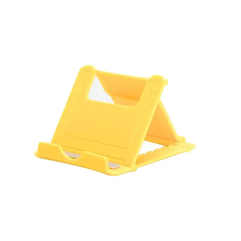 a yellow plastic phone stand