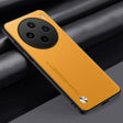 Yellow smartphone with a circular quad-camera setup on the back.