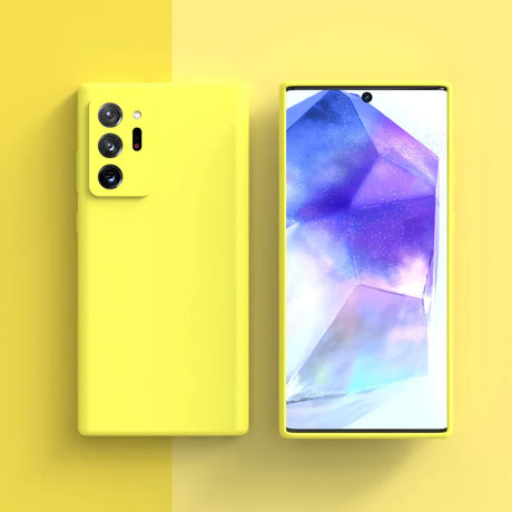 Yellow smartphone with a triple camera setup and a colorful display showing abstract shapes.