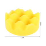 a yellow sponge sponge with a white background