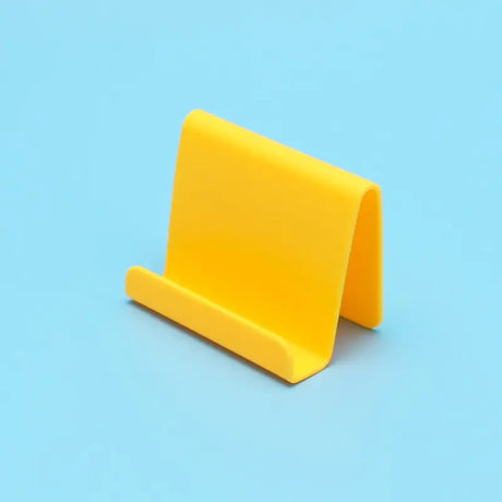 yellow plastic chair on blue background