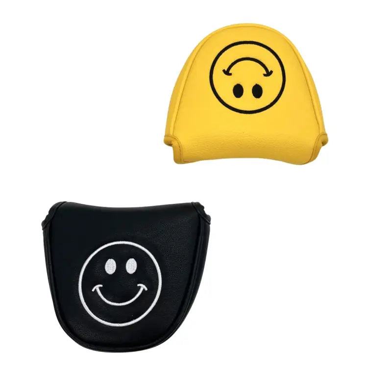 a yellow and black smiley face shaped hat