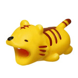 a yellow toy with a tiger on it’s back