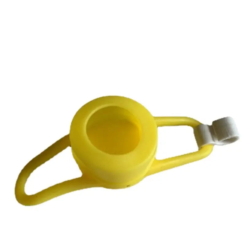 a yellow watering hose with a white handle