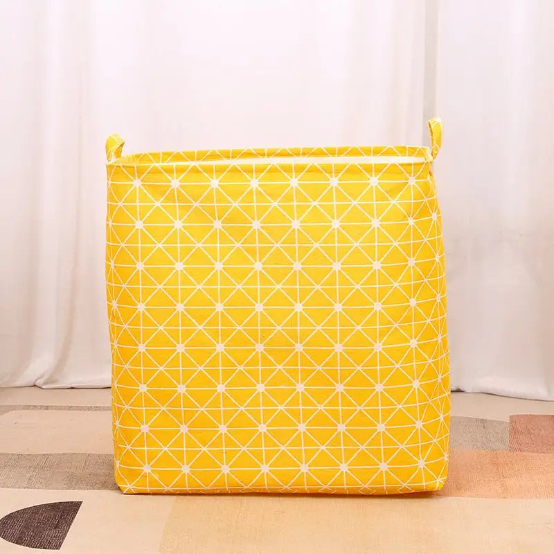 a yellow and white geometric pattern on a white background