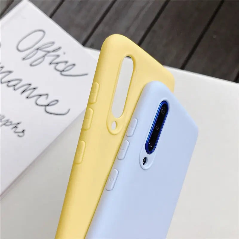 the back of a yellow iphone case