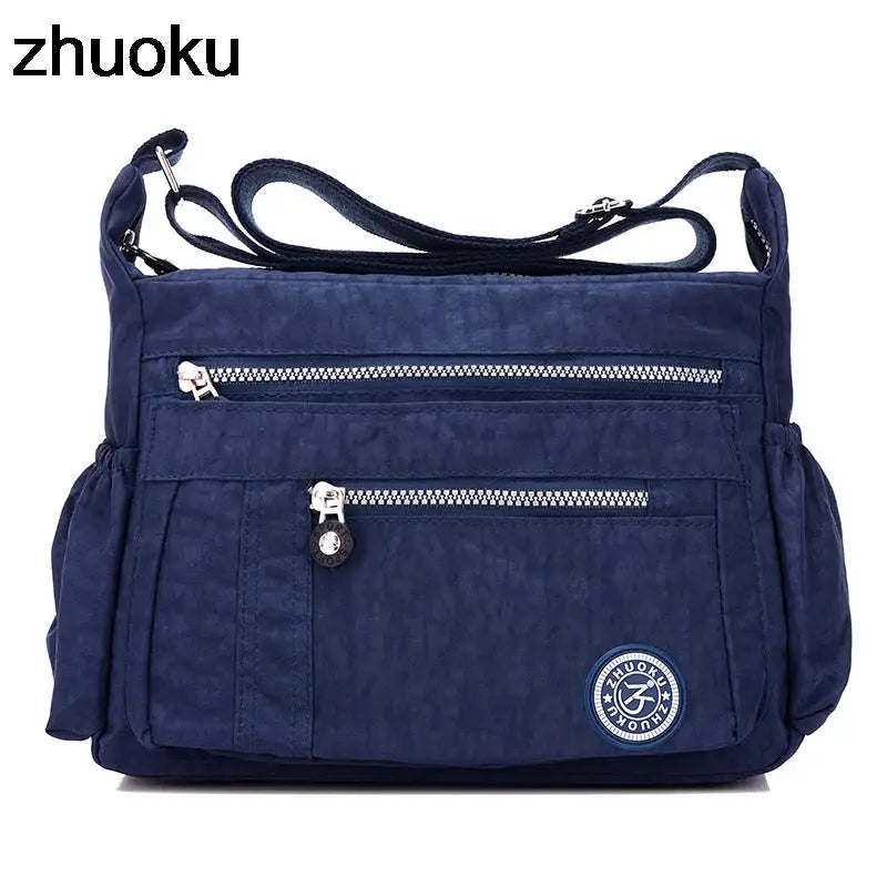 a blue bag with zippers and zippers