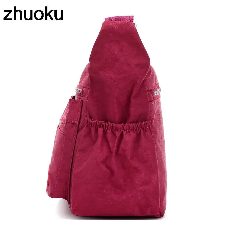 a red backpack bag with a zipper closure