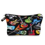 a black cosmetic bag with guitars on it